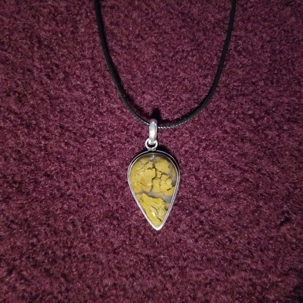 Golden brown moss agate pendant, silver plate on a black cord, artisan, new